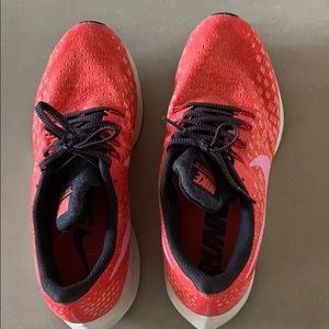 red/ pink nike running shoes
